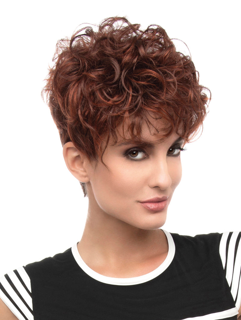 headshot of model wearing red curly pixie cut wig