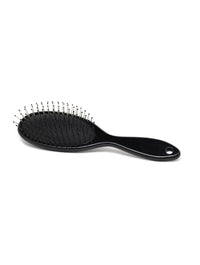 Black Envy Wigs brush against white background