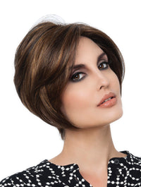 Headshot of model wearing brown chin length wig