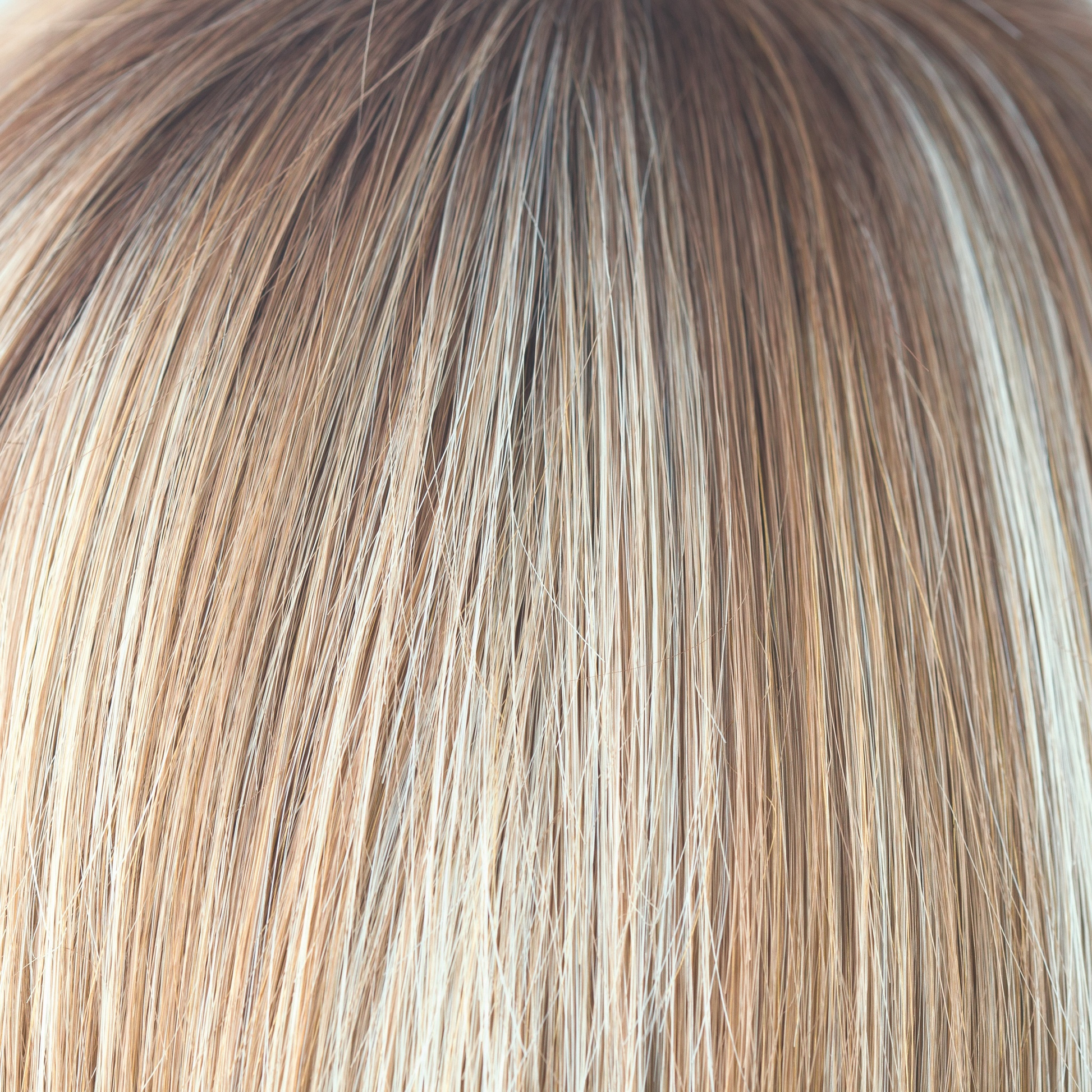 Nutmeg-F  -  This scrumptious rooted nutmeg blond with medium golden rooted base, blends into blond cream tones, warm coconut and honey slices. Nutmeg-F is classy and defined!